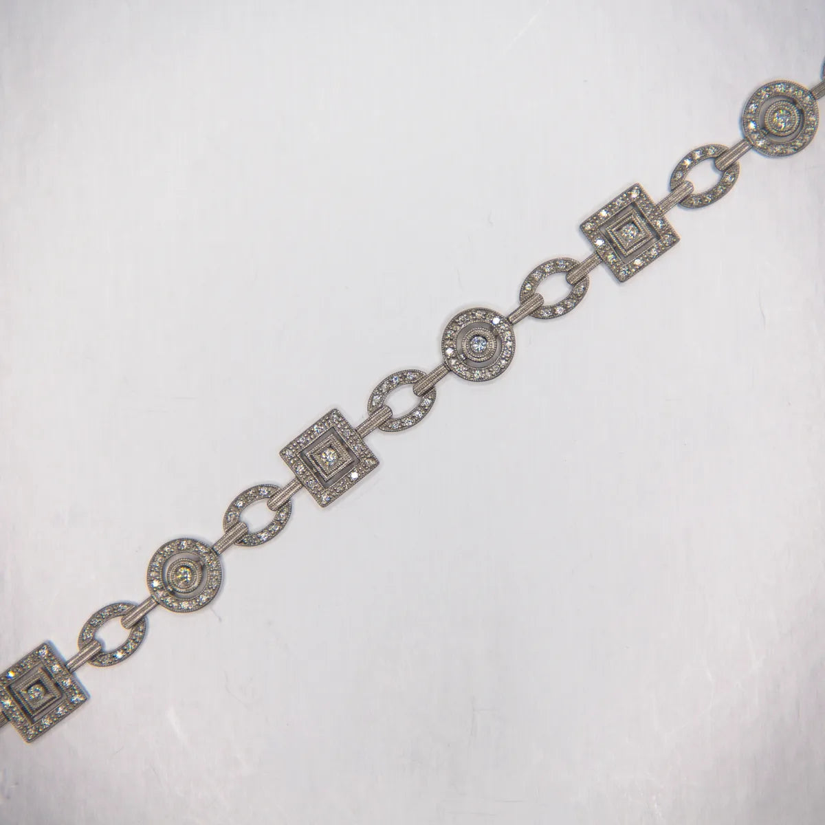 1.04 carats fine diamonds in geometric shaped links/ 14k White Gold Bracelet