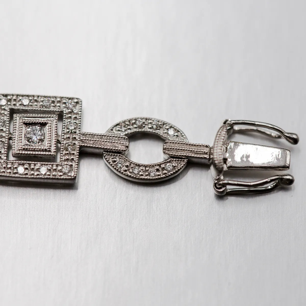 1.04 carats fine diamonds in geometric shaped links/ 14k White Gold Bracelet