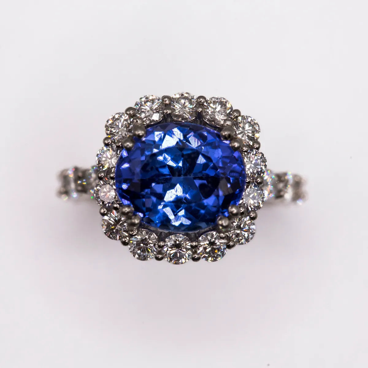 7.80 carats total Ceylon oval sapphire and diamond 950 Platinum Diamond Ring