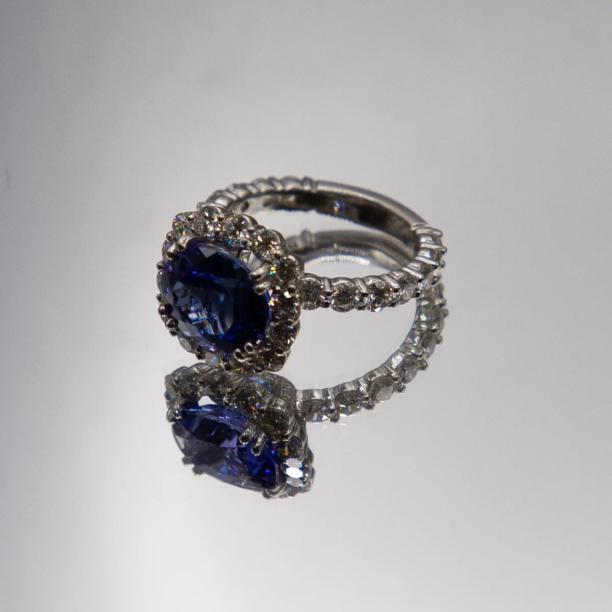 7.80 carats total Ceylon oval sapphire and diamond 950 Platinum Diamond Ring