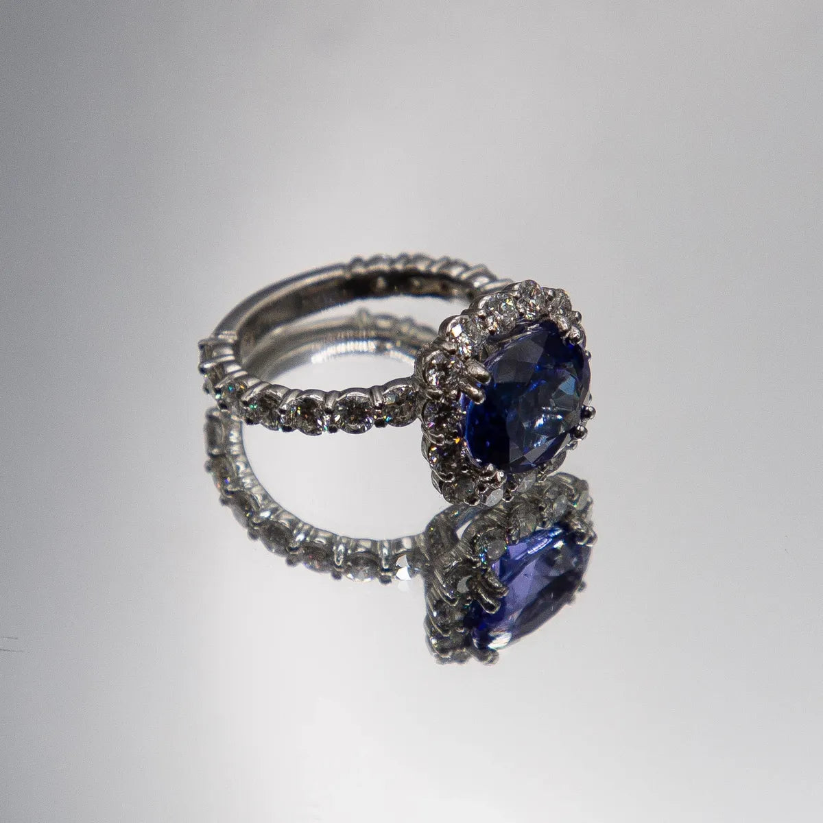 7.80 carats total Ceylon oval sapphire and diamond 950 Platinum Diamond Ring