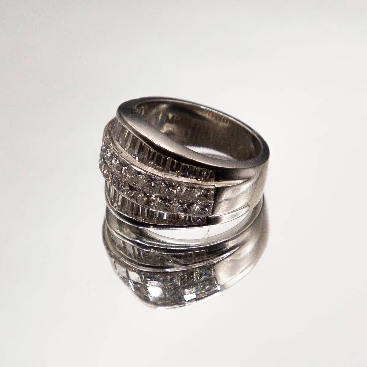 3.07 Carats.950 Platinum. Invisible-set Collection White, VVS Princess and Baguette Diamonds..