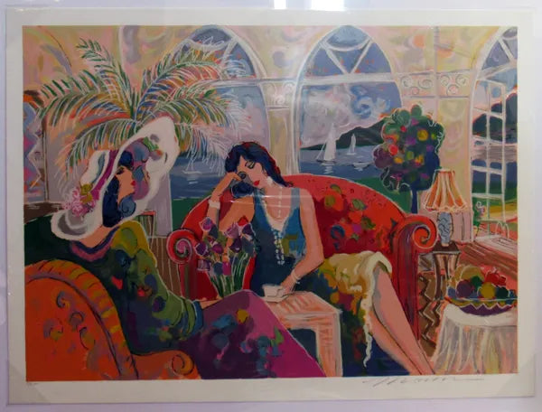 Two Women On Orange Couch by Isaac Maimon