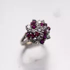 18k 2.50 carats ruby and 0.92 carats diamond pinwheel cluster. Florida estate.