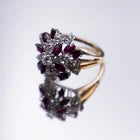 18k 2.50 carats ruby and 0.92 carats diamond pinwheel cluster. Florida estate.