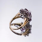 18k 2.50 carats ruby and 0.92 carats diamond pinwheel cluster. Florida estate.