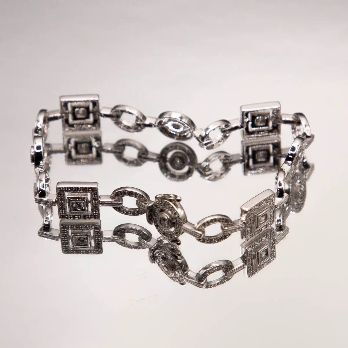 1.04 carats fine diamonds in geometric shaped links/ 14k White Gold Bracelet