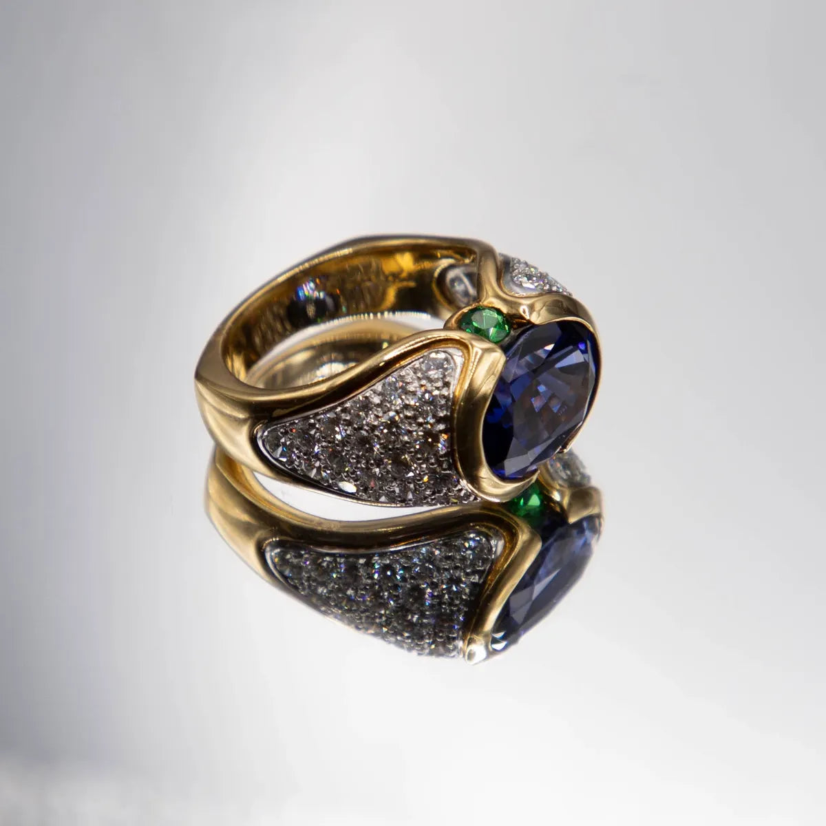 18k Gold/ 6.80ct. Fine Tanzanite Oval/ Tsavorite Garnet 0.50ct/ Diamonds 2.24cts