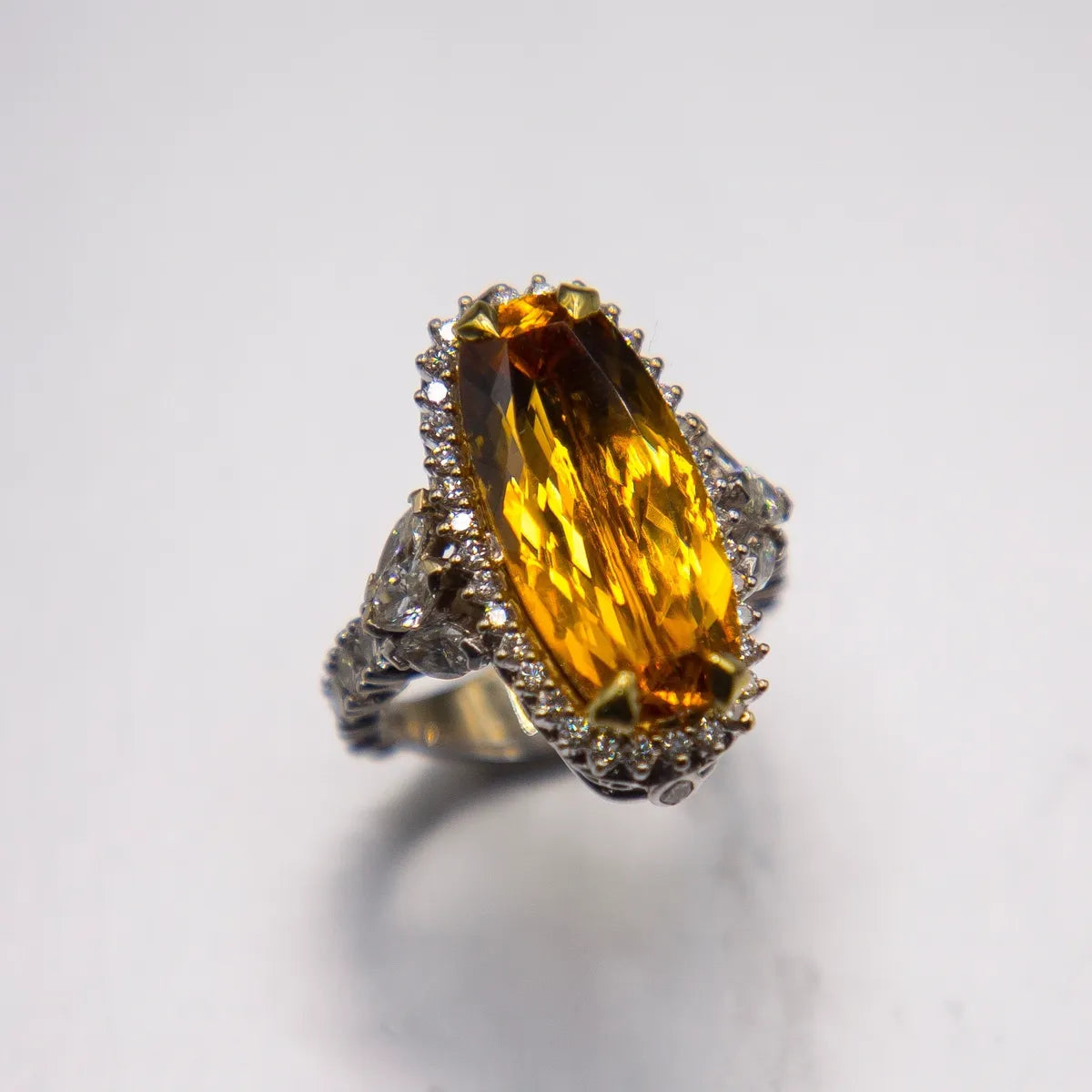10.20 Imperial Topaz Idar Oberstein-cut Cognac color 3.64cts. 18k Diamond Ring